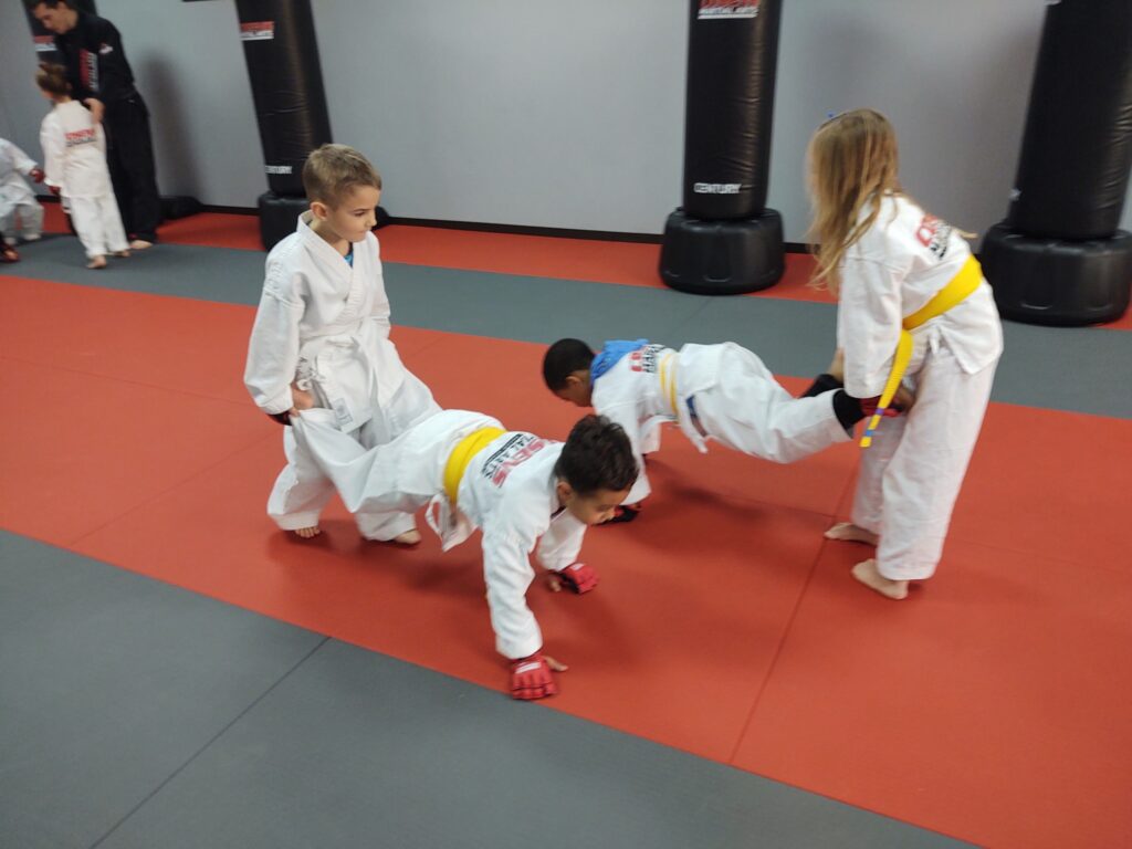 Oxford martial arts students learning to share and cooperate