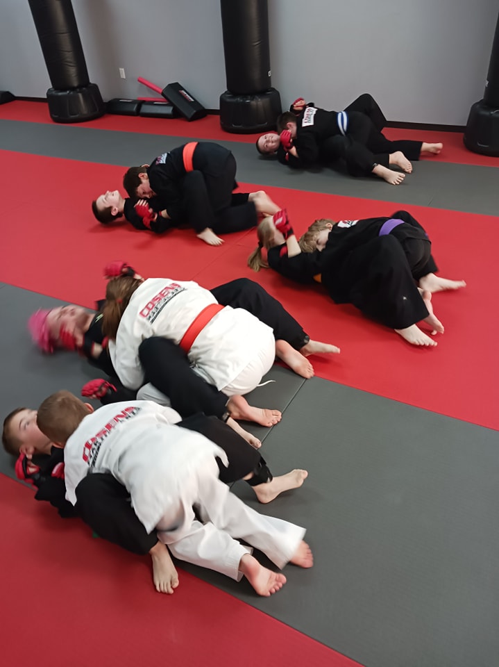 Oxford kids working together in a martial arts class