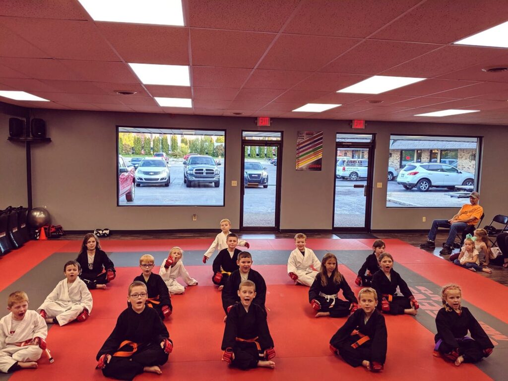 Oxford kids practicing focus during karate training